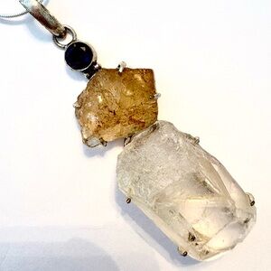 3 inch, Crystal Quartz, rough Citrine, and Amethyst pendant on a silver chain.